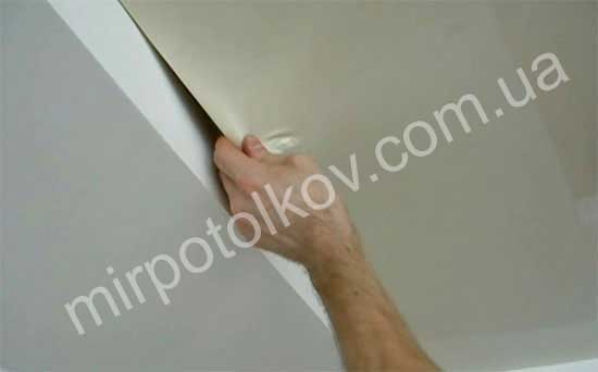 відстібаємо натяжну стелю